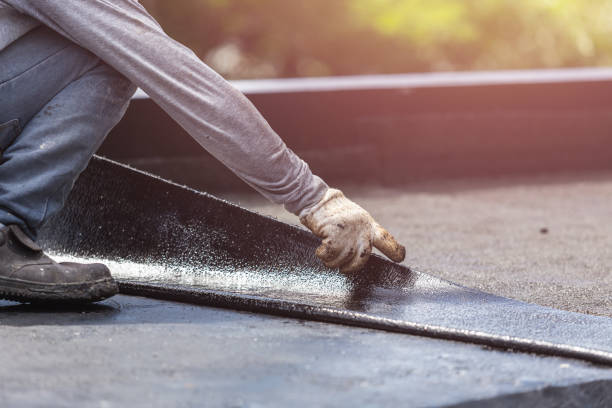 Professional Basement Waterproofing technician working in Hancock, MD